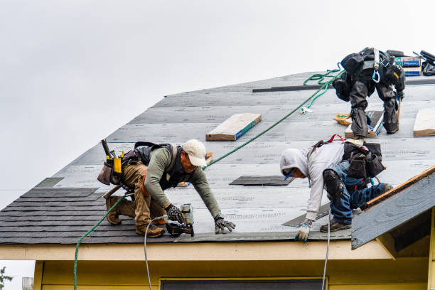 Professional Gutter Installation technician working in Bryantville, MA